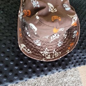 A boy's skeleton hat safari style with snap on each side
